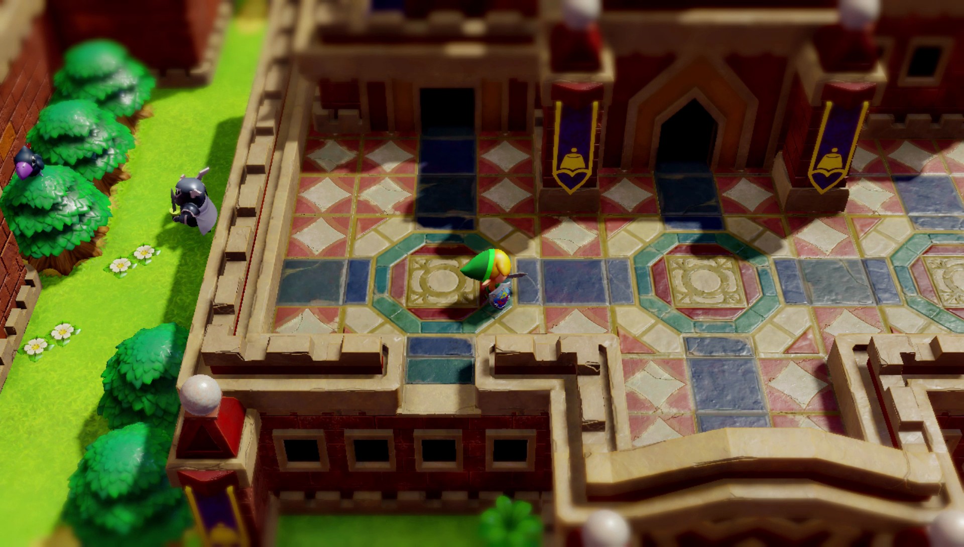 A screenshot of Zelda: Link’s Awakening, showing Link at a temple entrance