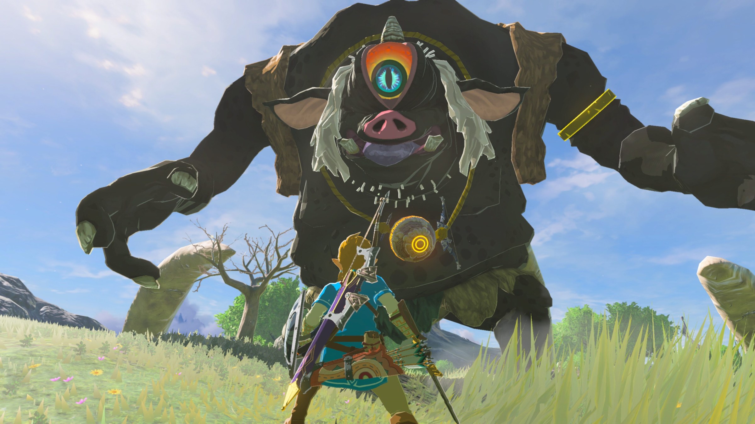 Link stands before a giant Hinox in Zelda: Breath of the Wild on Switch 2